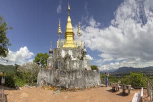 The golden stupa on the top of Mount Phou Si in Luang Prabang, Laos.